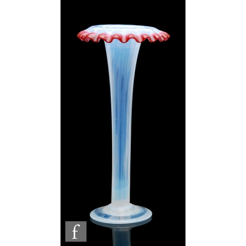 9100 - A large late 19th Century lily vase of footed and fluted form with roll rim, decorated with an appli... 