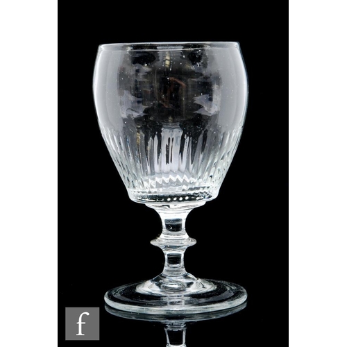 9104 - A late Georgian rummer circa 1800, the ovoid bowl with basal moulding above a plain stem with medial... 