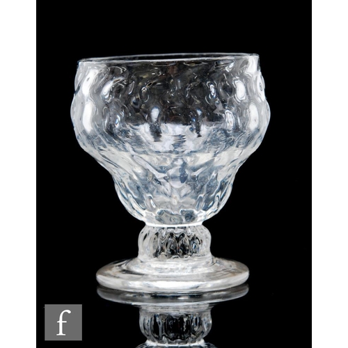 9106 - An 18th Century Monteith or bonnet glass circa 1750, the ogee bowl with a diamond mould above a shor... 