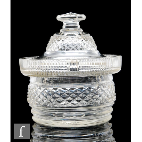 9107 - A late 18th Century Anglo-Irish covered sugar, the cut and polished base with a band of strawberry d... 