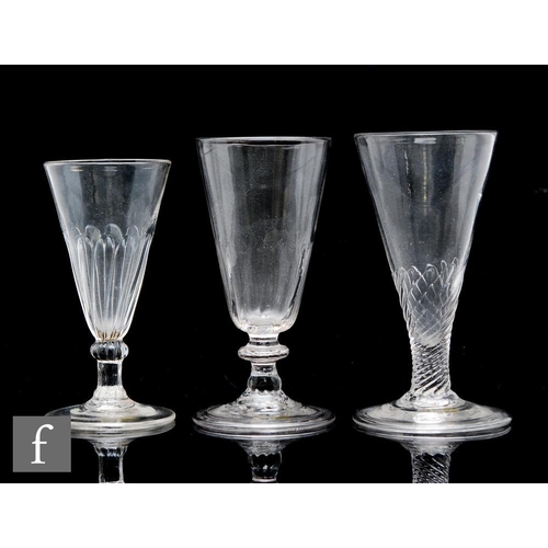 9109 - An 18th Century ale glass circa 1790-1800, the conical bowl with wrythen moulding, raised to a folde... 