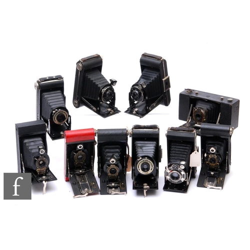 111 - An assorted collection of Kodak folding cameras, to include two Six-20 Kodak Jnr. f/7.7, a 1930s Six... 