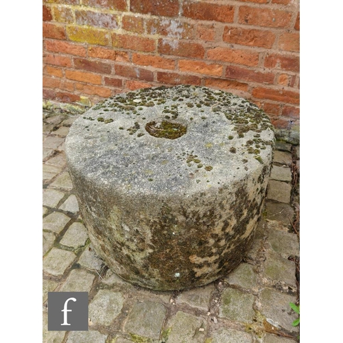 1116 - A large 19th Century circular sandstone grinding wheel, height 44cm x width 62cm.NB - Viewing strict... 