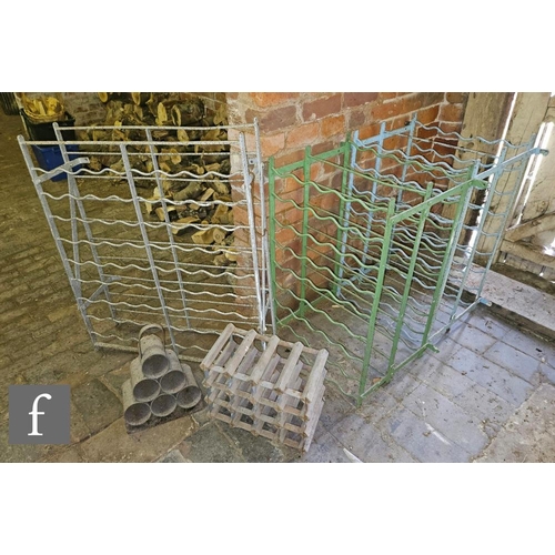 1119 - A pair of early 20th Century or later cast iron floorstanding wine racks, height 93cm x 53cm, a sing... 