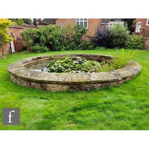 1122 - Twenty five 19th Century sandstone circular coping stones used to form the border of a garden pond, ... 