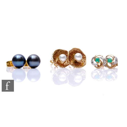 656 - Three pairs of assorted 9ct stud earrings, one emerald and diamond, the other two with cultured pear... 