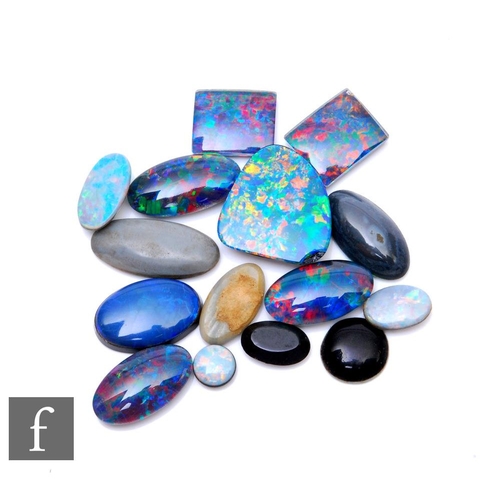 673 - Fifteen assorted loose opal doublets and triplets to include oval and rectangular cut examples, one ... 