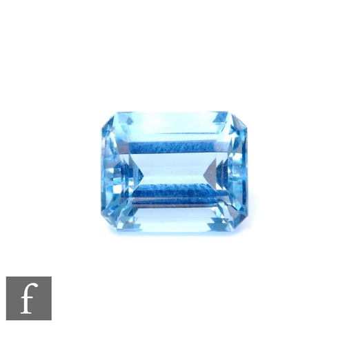 677 - A loose cut and polished single aquamarine emerald cut stone, 9.5mm x 8mm x 6mm, weight 3.10ct.