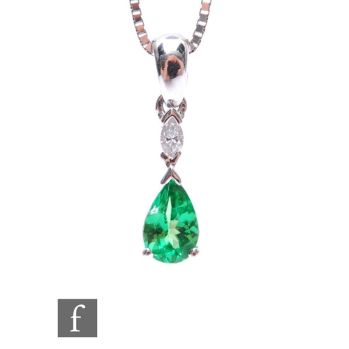 684 - An 18ct hallmarked tsavorite and diamond pendant suspended from a 18ct box chain, with matching drop... 