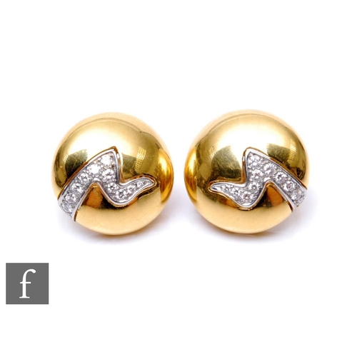 686 - A pair of 18ct hallmarked clip on circular earrings, each detailed with a diamond set lightning bolt... 