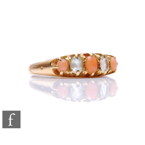 694 - An 18ct hallmarked coral and white paste five stone boat shaped ring, weight 3.5g, ring size P, Birm... 