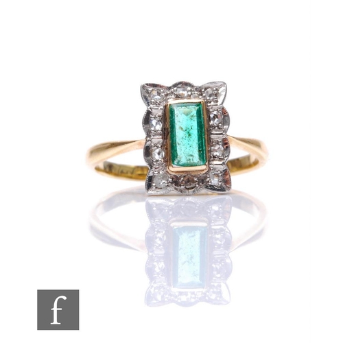 698 - An 18ct emerald and diamond cluster ring, collar set rectangular emerald within a ten stone diamond ... 