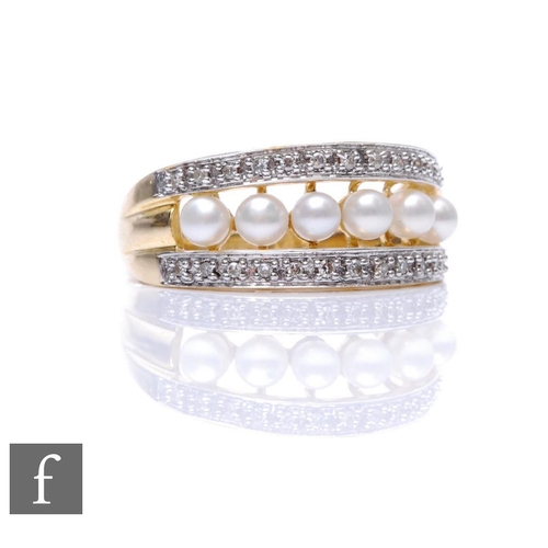 699 - A 9ct hallmarked cultured pearl and diamond ring six central pearls within a diamond set border abov... 