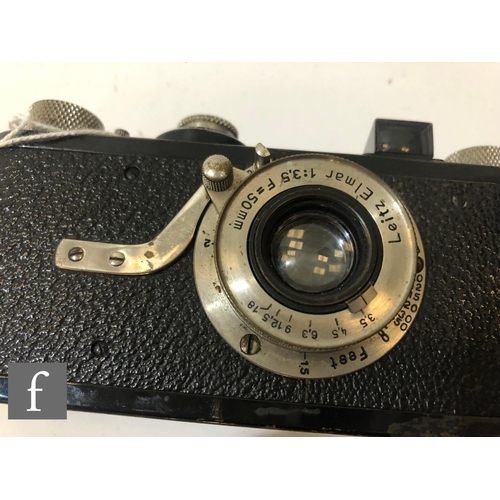 154 - A 1928 Leica I rangefinder camera, black, No.11432, with Leitz Elmar f3.5 50mm lens.