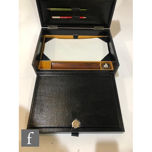 512 - A Victorian black leather writing box, lift out slope and fitted interior, width 36cm.