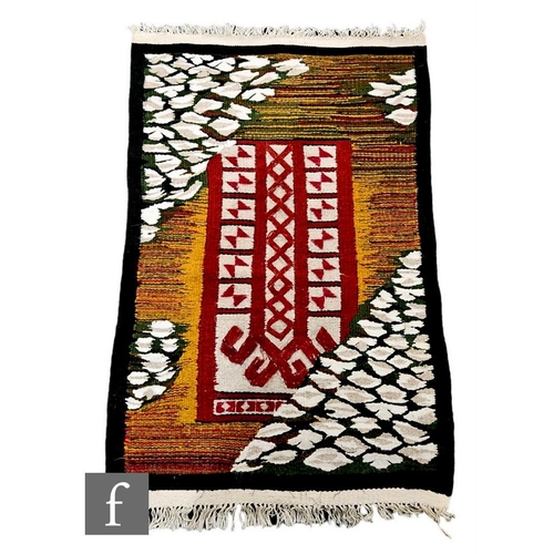 1110 - Three small flat weave Kilim rugs, the first of blue, orange and brown colours and bearing a Shiraz ... 