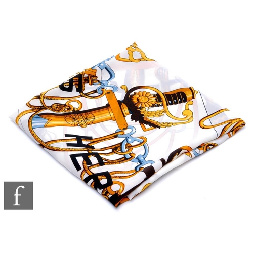 1127 - Hermes - A Cliquetis silk scarf decorated with sword hilts and pommels, no box, 89cm x 85cm.