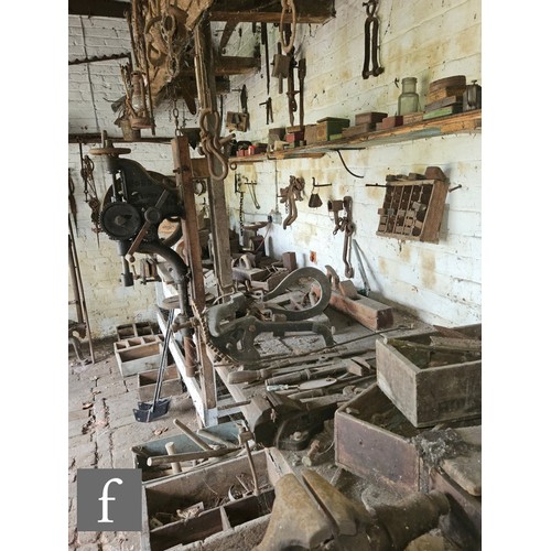 1115 - The contents of an entire working Victorian forge to include a large pair of hand operated studded l... 