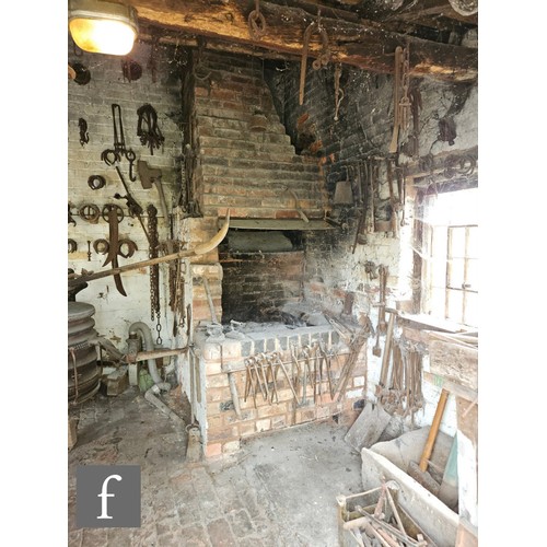 1115 - The contents of an entire working Victorian forge to include a large pair of hand operated studded l... 