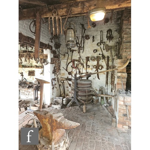 1115 - The contents of an entire working Victorian forge to include a large pair of hand operated studded l... 