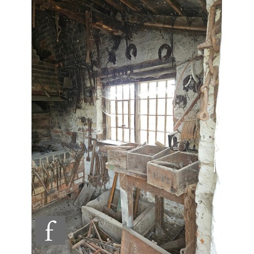 1115 - The contents of an entire working Victorian forge to include a large pair of hand operated studded l... 