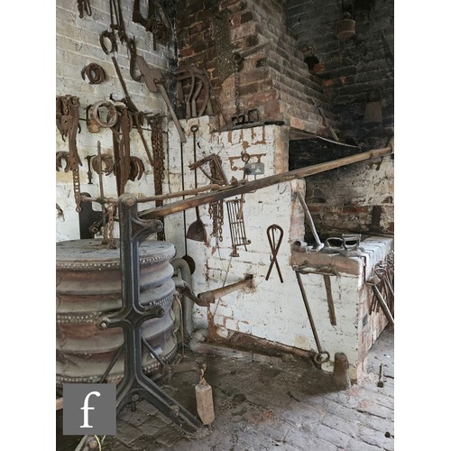 1115 - The contents of an entire working Victorian forge to include a large pair of hand operated studded l... 