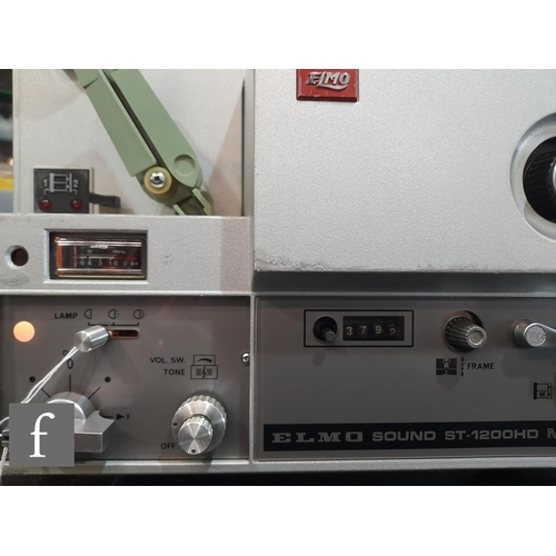 178 - An Elmo ST-1200 M.O two track 8mm sound projector, with f/12.5mm-25mm lens and instruction manual, t... 