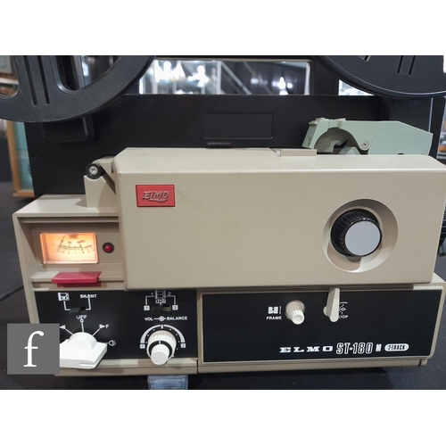 178 - An Elmo ST-1200 M.O two track 8mm sound projector, with f/12.5mm-25mm lens and instruction manual, t... 