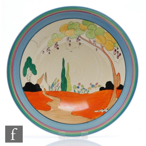 151 - Clarice Cliff - Tulips - A 13 inch charger circa 1933, hand painted with a stylised cottage garden s... 