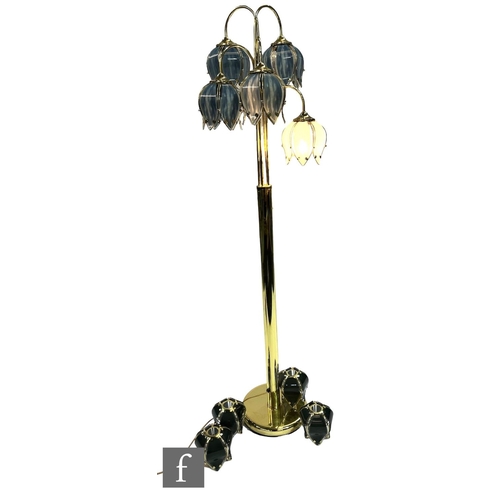 1172 - Unknown - A 1980s gilt metal 'Hollywood' floor lamp, the central column stem with four arched branch... 