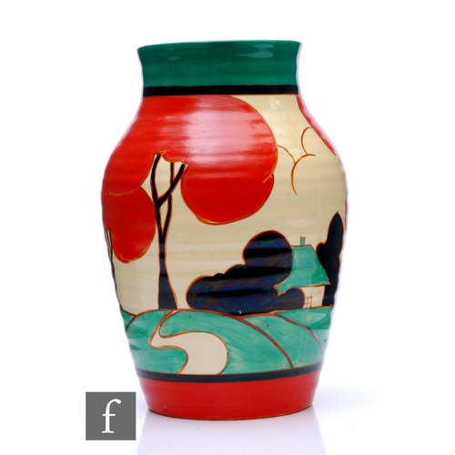 126 - Clarice Cliff - Red Autumn - An Isis vase circa 1930, hand painted with a stylised tree and cottage ... 