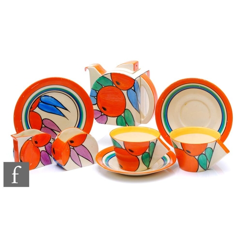 Clarice Cliff - Oranges - A Stamford early morning breakfast set circa 1931, comprising Stamford teapot, milk, sugar, two conical cups, two saucers and a side plate, all hand painted with stylised fruit and foliage with orange, black, blue and green banding, FANTASQUE and Bizarre mark with Lawleys gold backstamp.