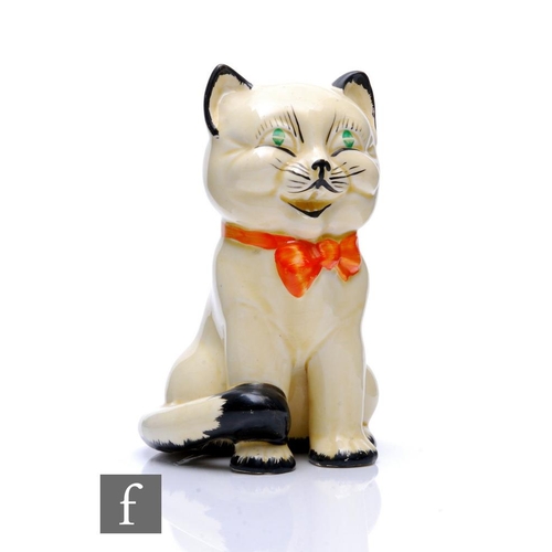 352 - Clarice Cliff - Laughing Cat - A novelty figure of a seated laughing cat wearing a large orange bow ... 