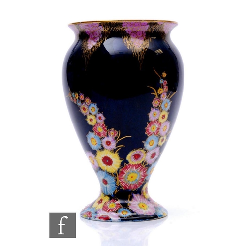 490 - Carlton Ware - An Art Deco shape 406 vase decorated in the Garden pattern with under and on glaze en... 