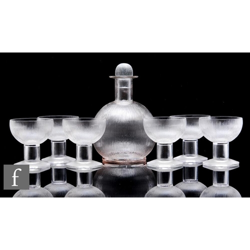 502 - Rene Lalique - A decanter of globe and shaft form in the Wingen pattern with fine vertical ribbed de... 