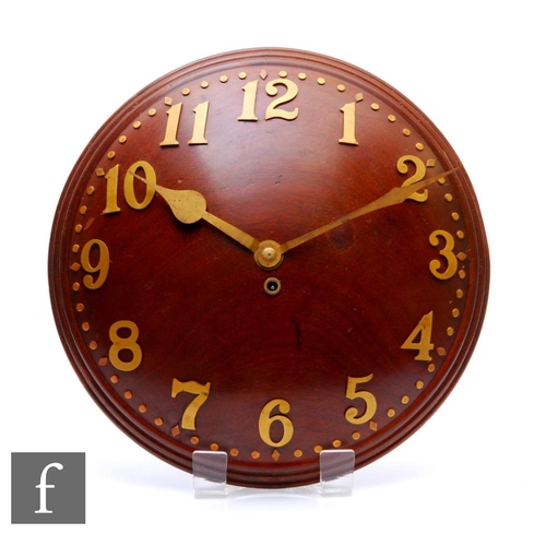 505 - Heals - An Art Deco convex walnut wall clock with gilt metal Arabic numerals, diameter 34cm, some we... 