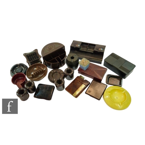 514 - Various Makers - A collection of 1930s and later bakelite smoking ephemera, to include approximately... 