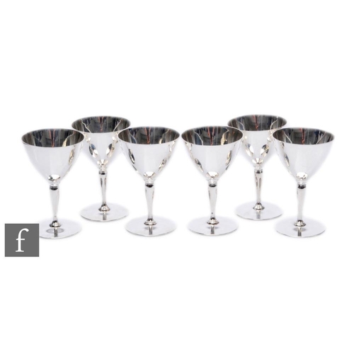 520 - Tiffany - A set of six American sterling silver goblets, circular foot below baluster stem and plain... 