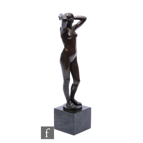 525 - E. R. Visinger - After Cartinet - A 1920s French bronze study of a female nude in standing pose with... 