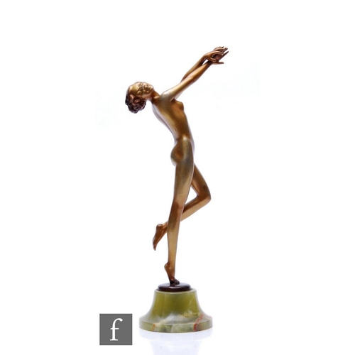 528 - Josef Lorenzl - An Art Deco patinated bronze figure of a female nude dancer, standing to one leg, th... 