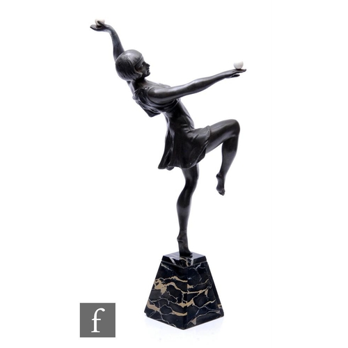 529 - After Marcel Bouraine - A large 1920s patinated bronze figure of a female dancer standing on one leg... 