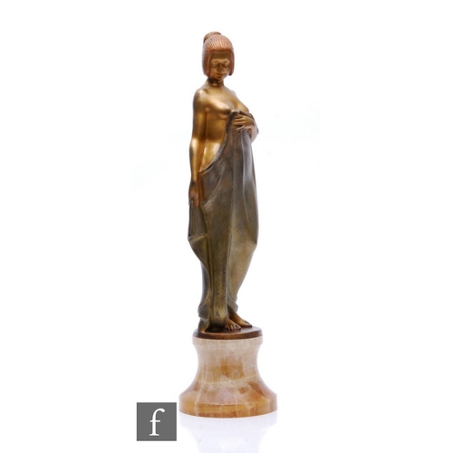 530 - Josef Lorenzl - An early 1920s gilt patinated spelter figure modelled as a semi clad female with dra... 