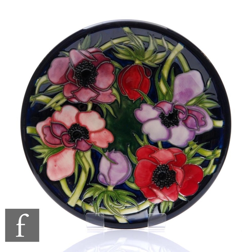 66 - Emma Bossons - Moorcroft Pottery - A plate of circular form, shape 783/10, decorated in the Anemone ... 