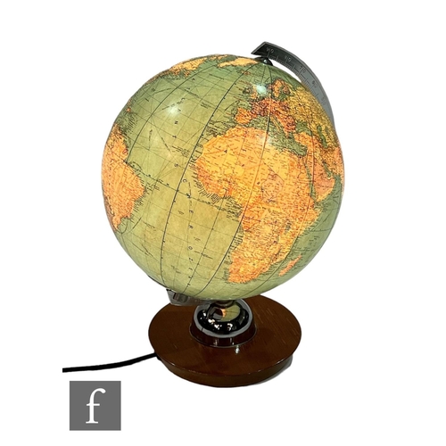 702 - JRO Globus - A 1960s illuminated globe with chromed metalwork, raised on a wooden base, height 38cm.