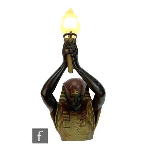 712 - Unknown - A mid Century vintage Pharaoh wall light, the figural relief moulded light fitting  modell... 