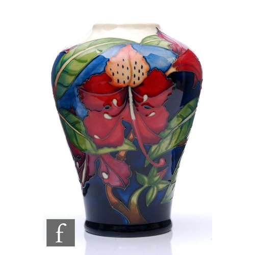 78 - Philip Gibson - Moorcroft Pottery - A vase of high shouldered tapering form, shape 576/9, decorated ... 