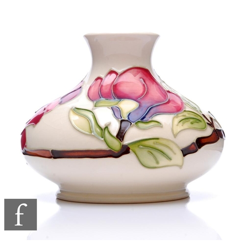 79 - Moorcroft Pottery - A small vase of squat ovoid form with flared neck, shape 32/5, decorated in the ... 