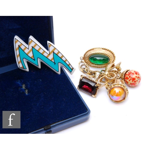 860 - Dorothy Hafner - Rosenthal - A brooch formed as a lightning bolt in turquoise and gold, stamped mark... 