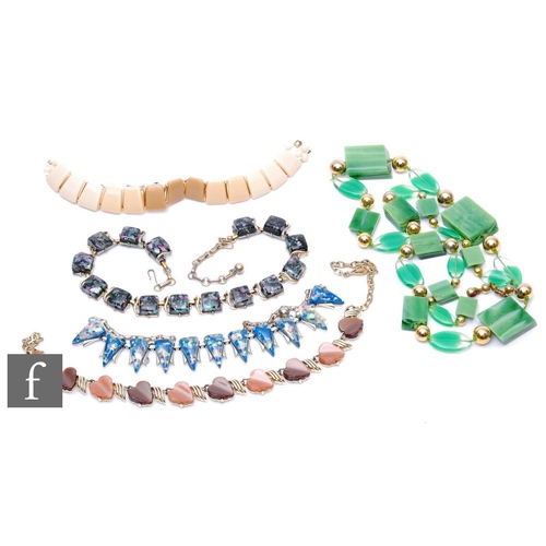 863 - Unknown - Five assorted vintage costume jewellery necklaces each set with plastic cabochons or beads... 