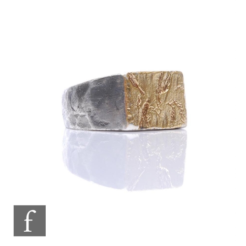 876 - Bjørg Nordli-Mathisen - A contemporary silver 'Might Have Been' ring, with a textured surface plated... 